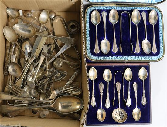 Two cased sets of silver teaspoons and tongs and a quantity of other small silver flatware including condiment spoons,